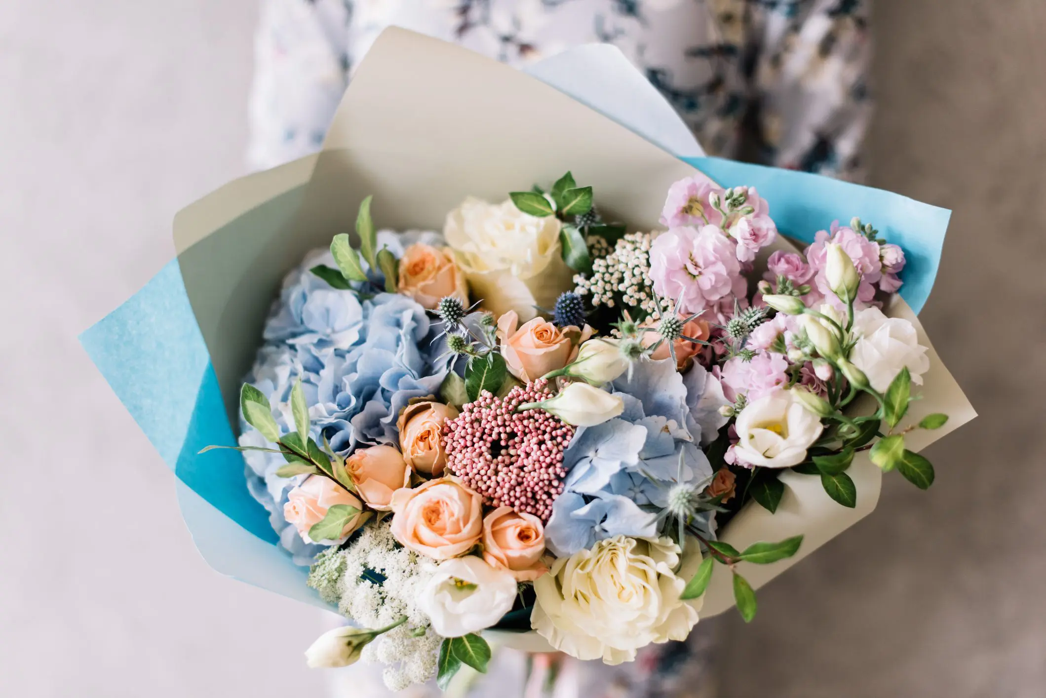 Colorful bouquet with roses and hydrangeas.