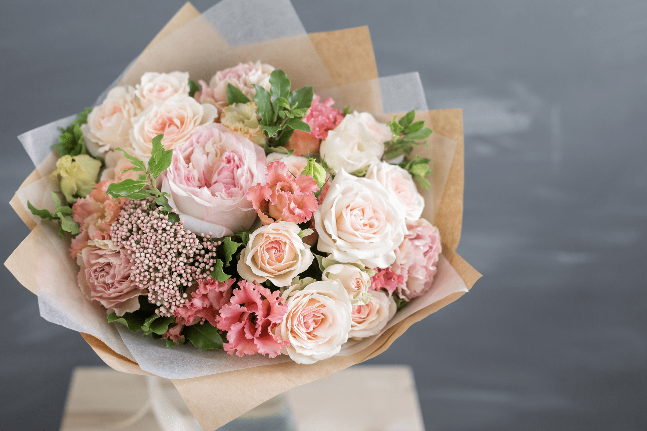 Bouquet of pink and white roses.
