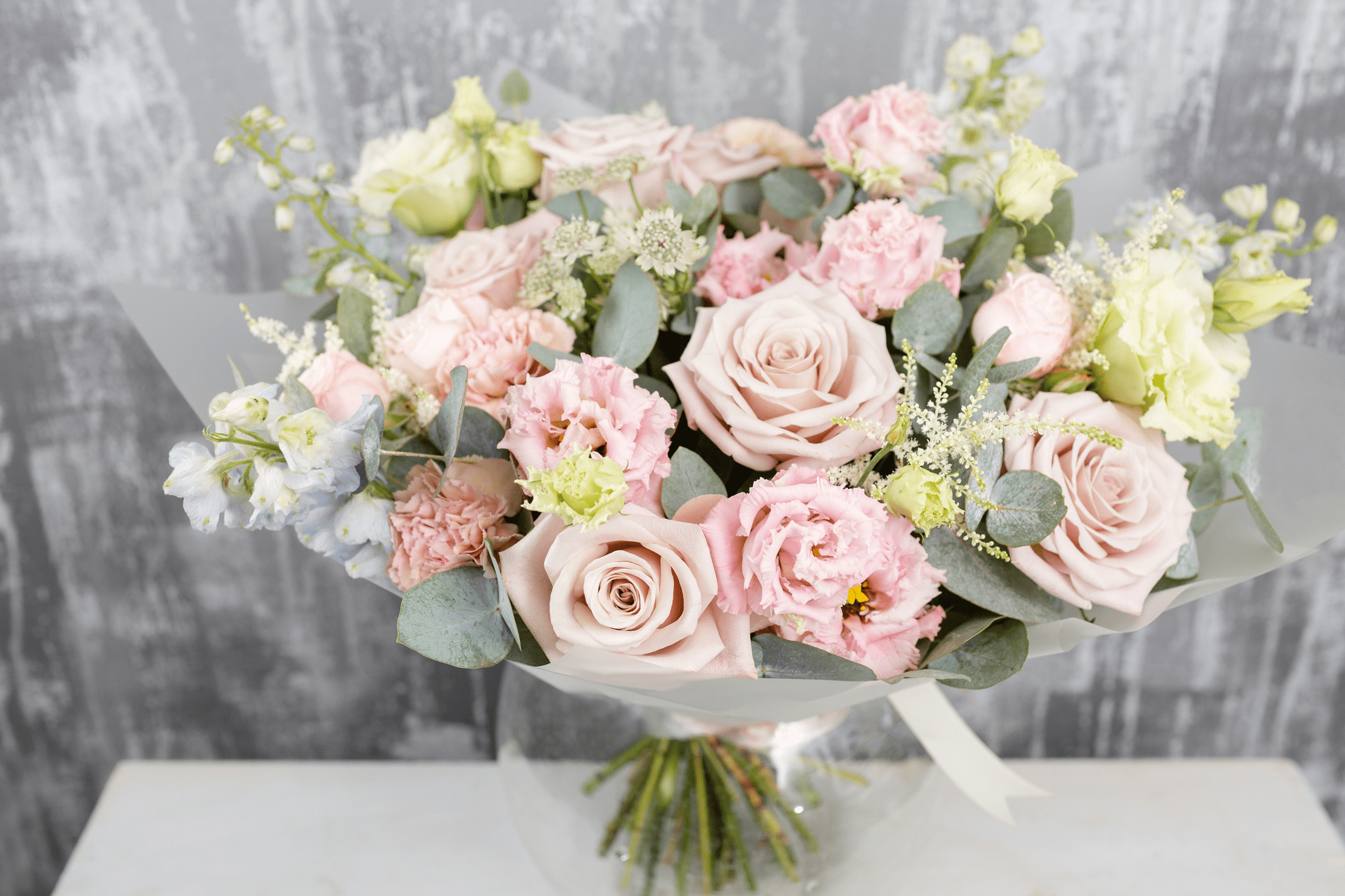 Bouquet of pink and white roses.