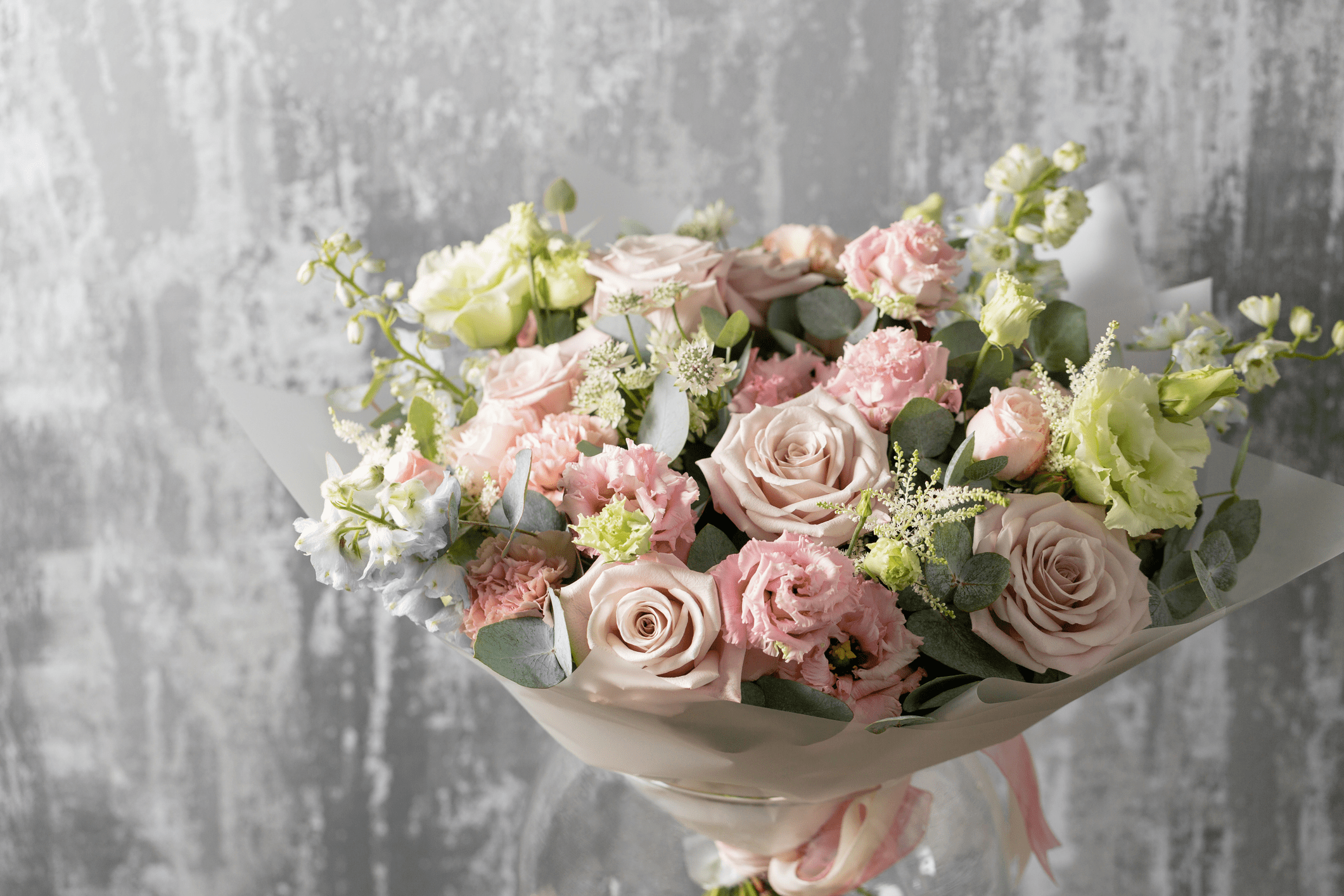 Bouquet of pink and white roses.
