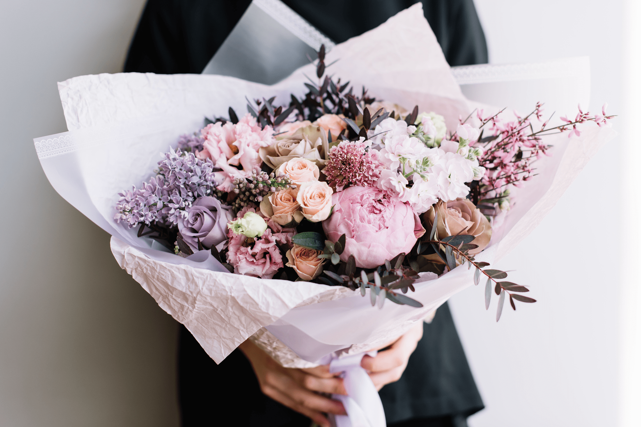 Elegant bouquet of pink and purple flowers.