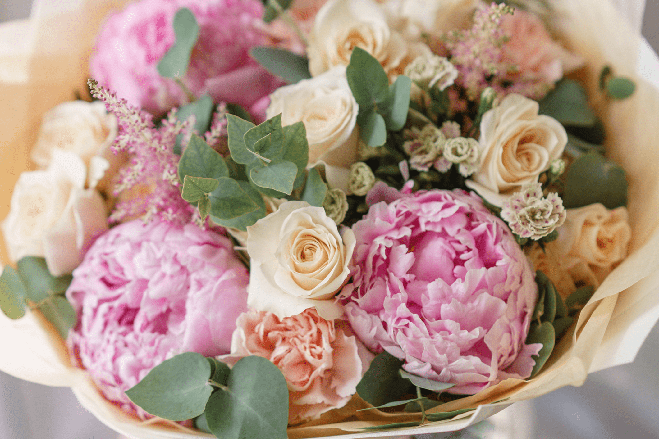 Bouquet of pink and white flowers, greenery.
